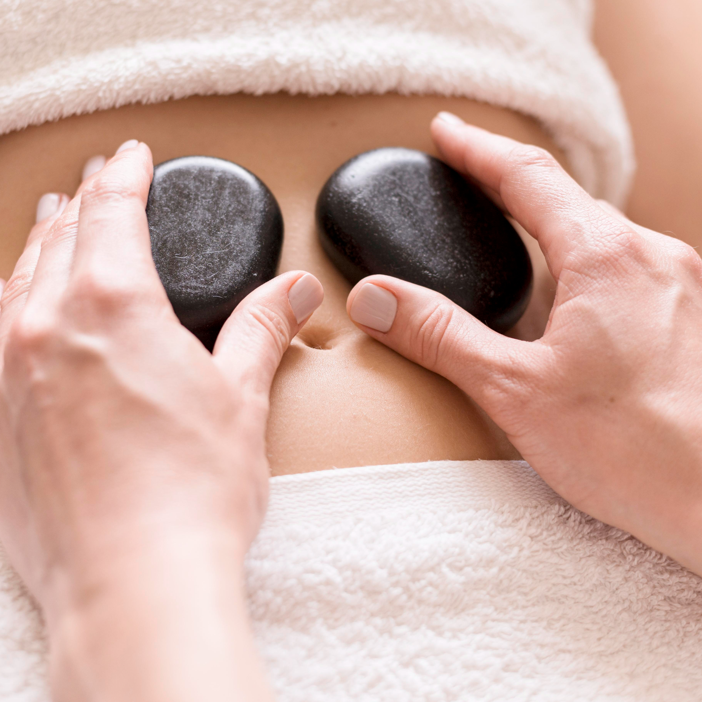 Massage aux pierres chaudes - dos