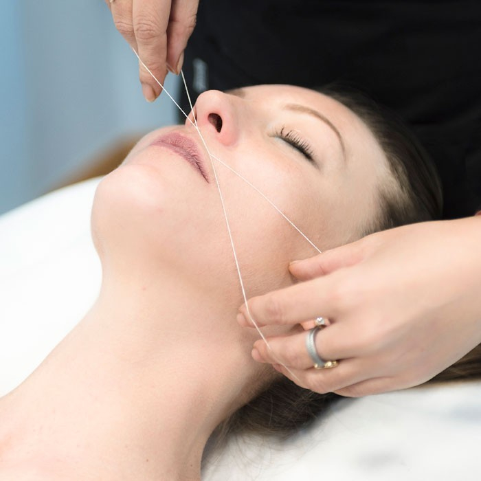 Depilación labio hilo