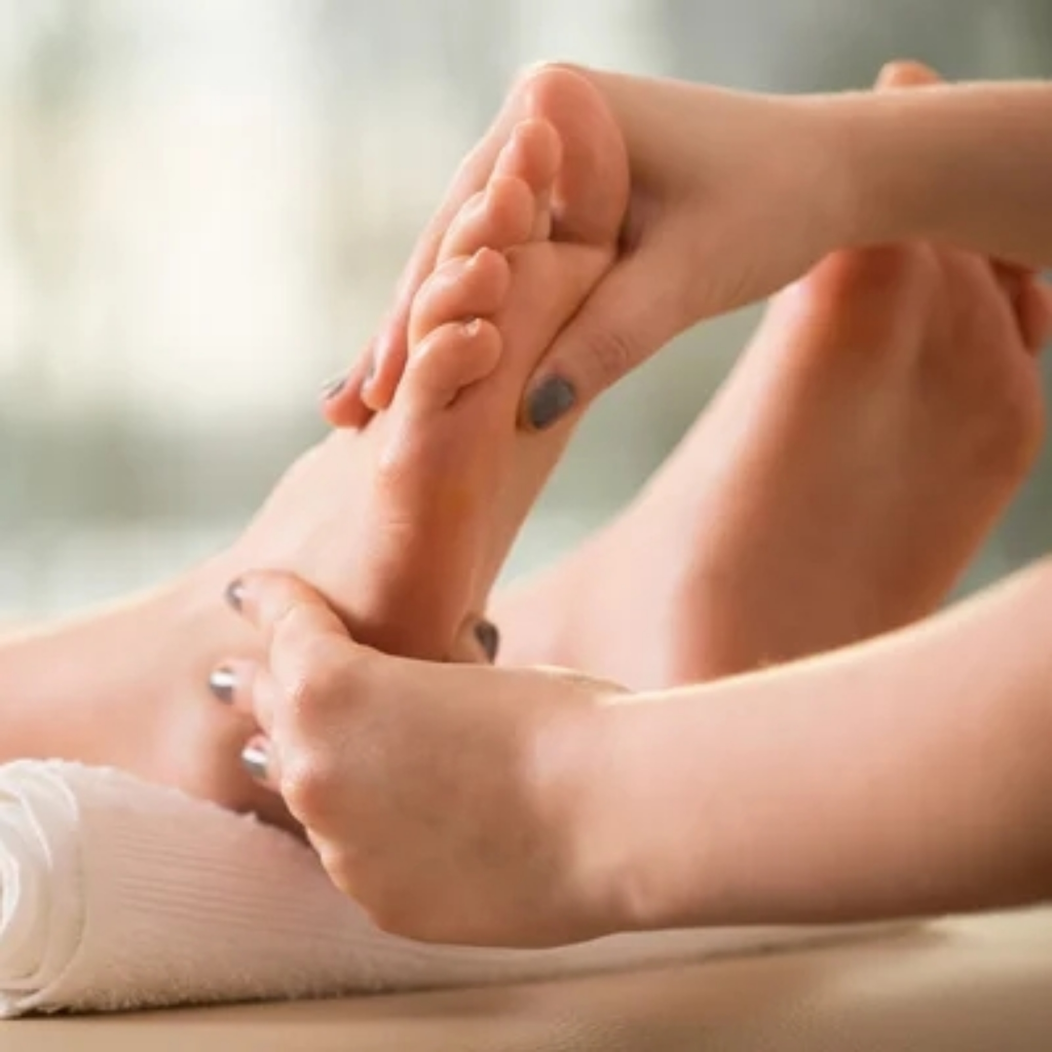 Massage des pieds aux H.E. - 30min
