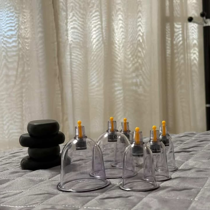 Massage jambe lourdes + Pose de ventouses
