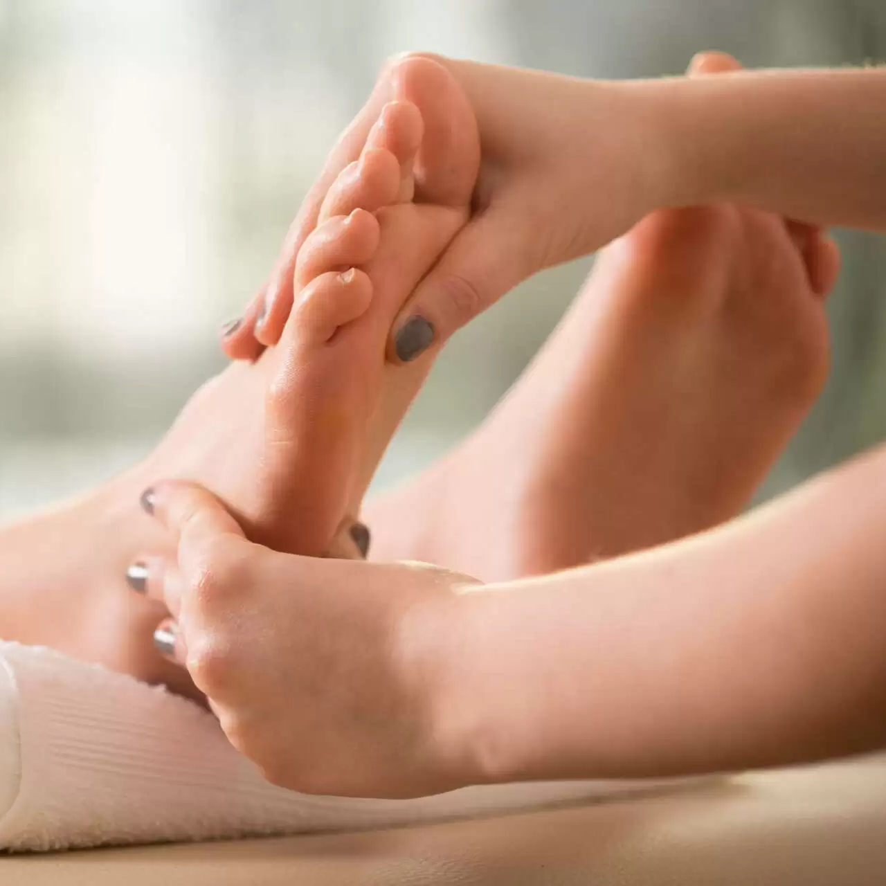 Reflexní masáž plosek nohou